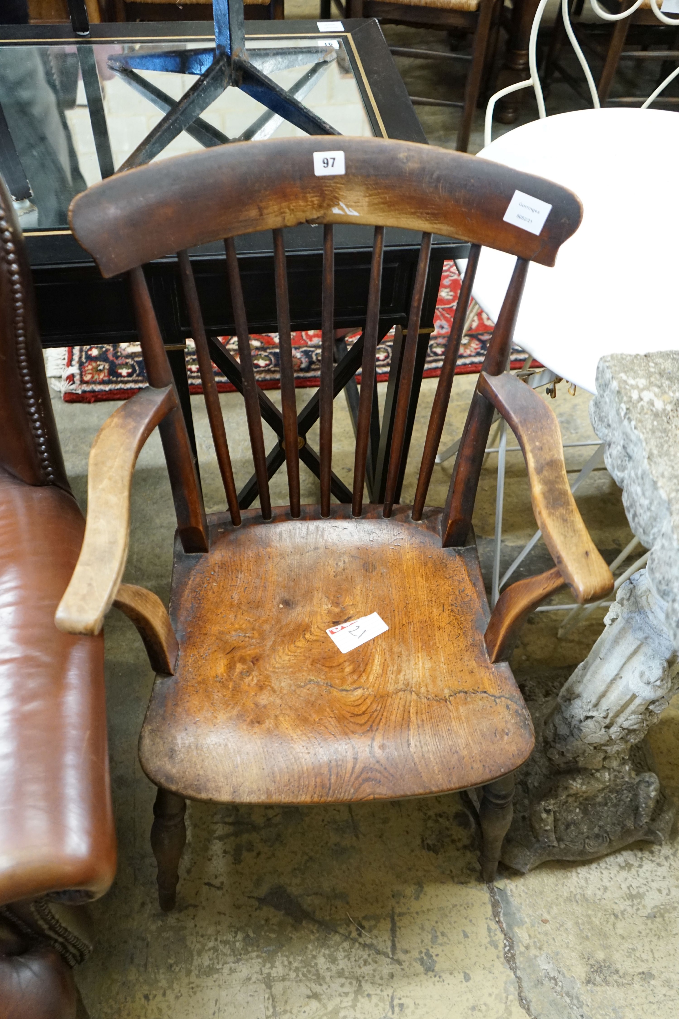 A Victorian elm and beech Windsor comb back elbow chair, width 53cm, depth 42cm, height 93cm